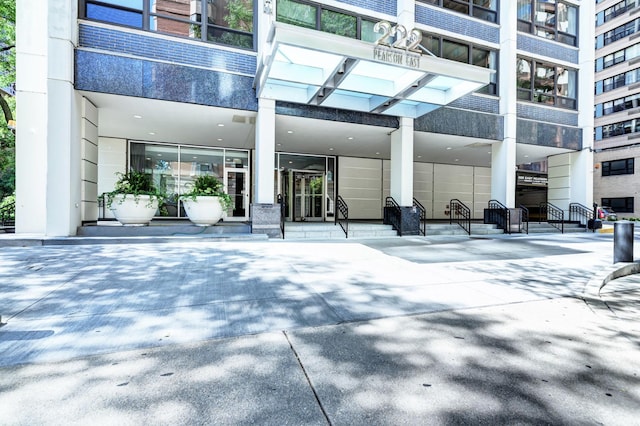 entrance to property with a patio