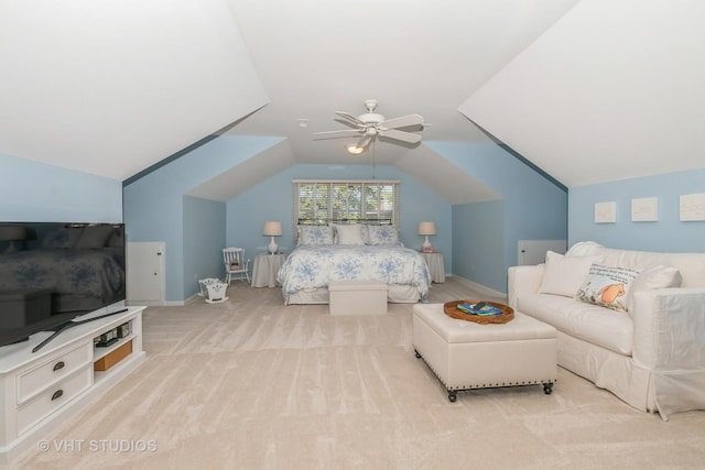 bedroom with light carpet, lofted ceiling, a ceiling fan, and baseboards