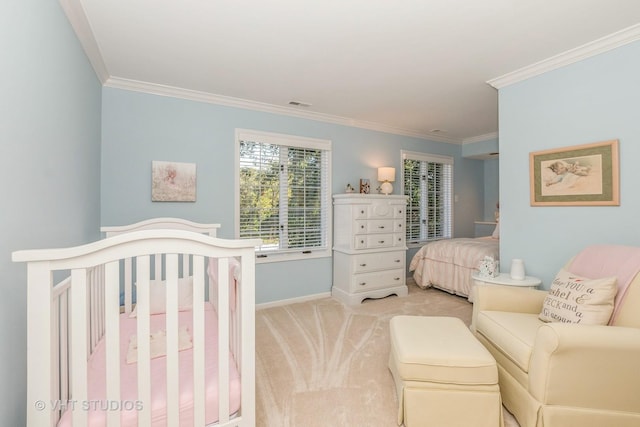 bedroom with crown molding, baseboards, visible vents, and light colored carpet