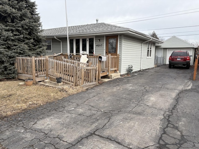 4257 W SW Hwy, Hometown, IL 60456 - single story home featuring a garage, driveway, a porch, and roof with shingles
