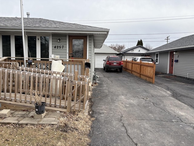 4257 W SW Hwy, Hometown, IL 60456 - view of front of property with a shingled roof, fence, and a garage