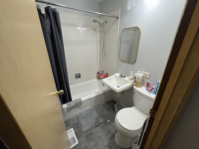 4257 W SW Hwy, Hometown, IL 60456 - full bathroom with shower / tub combo, visible vents, toilet, tile patterned flooring, and a sink