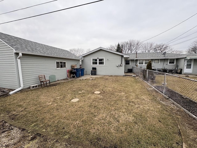 4257 W SW Hwy, Hometown, IL 60456 - rear view of house featuring fence, a lawn, and roof with shingles