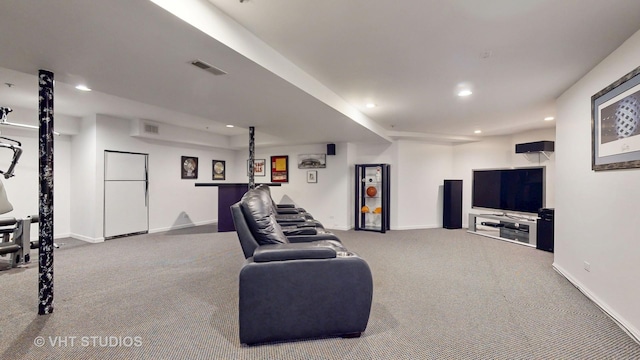 living room with carpet floors, baseboards, visible vents, and recessed lighting