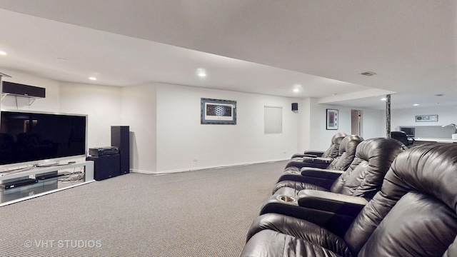 carpeted living area with visible vents, baseboards, and recessed lighting