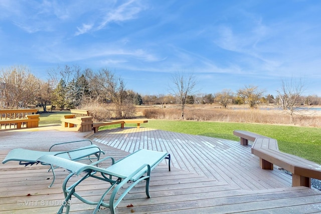 wooden deck with a yard