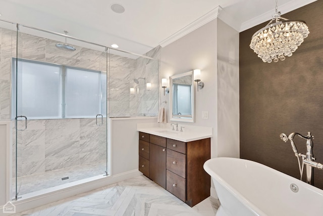 full bath featuring a freestanding tub, vanity, marble finish floor, ornamental molding, and a stall shower