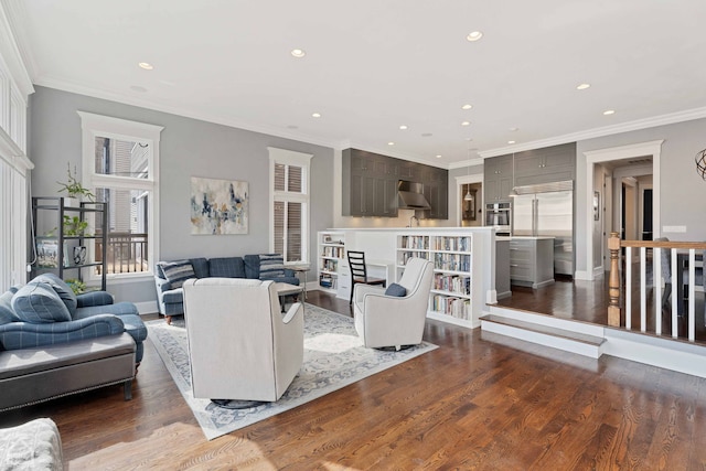 living room featuring recessed lighting, wood finished floors, and crown molding