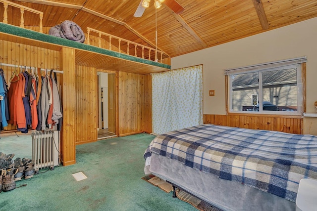 bedroom with high vaulted ceiling, wooden ceiling, wooden walls, radiator, and carpet