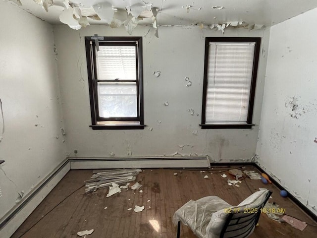 empty room with wood finished floors