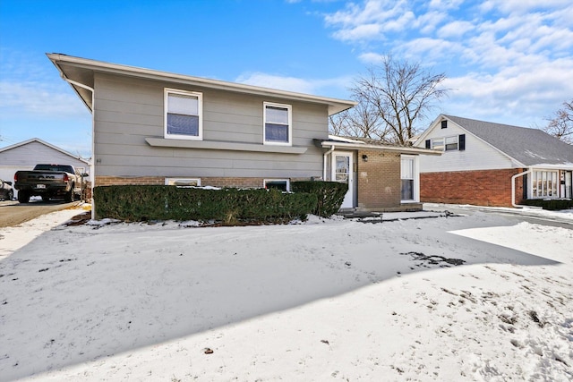 split level home featuring a garage