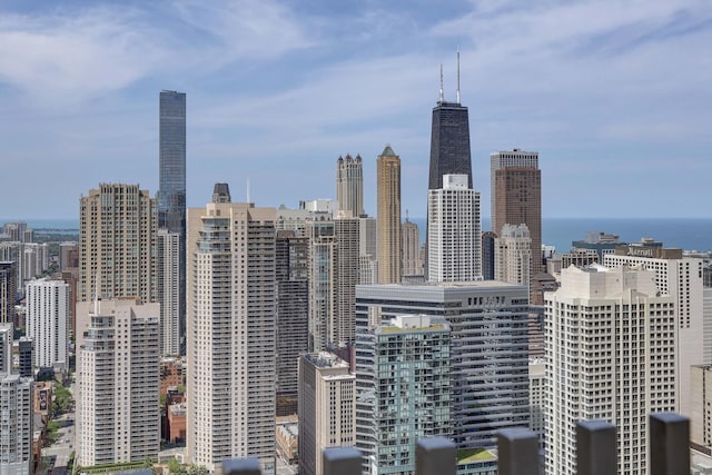 property's view of city with a water view