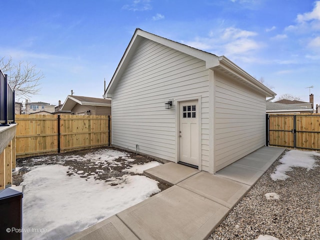 back of property with fence