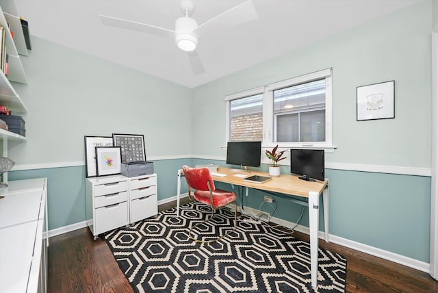 home office featuring dark wood-style floors, baseboards, and a ceiling fan