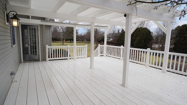 wooden terrace with a pergola