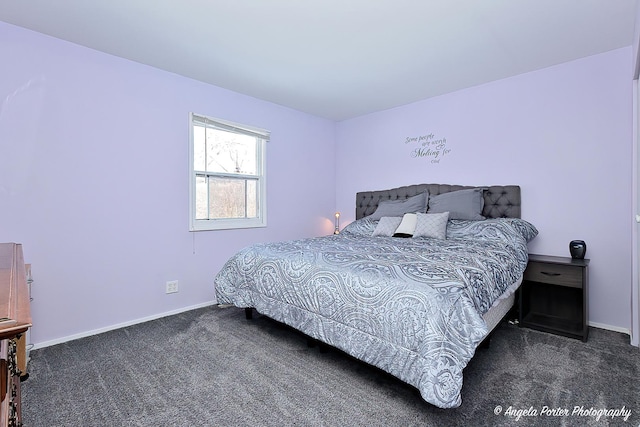 carpeted bedroom with baseboards