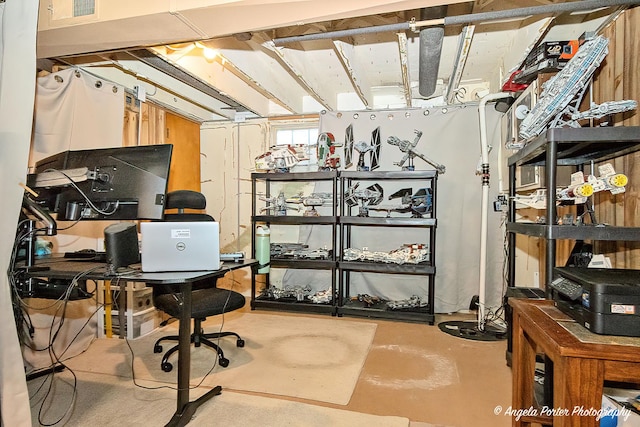 office area featuring concrete floors and visible vents