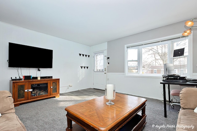 living room featuring baseboards