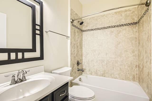 full bath featuring toilet, vanity, and shower / tub combination