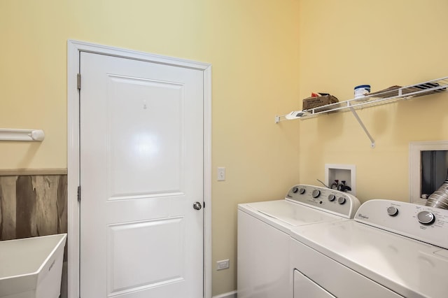 clothes washing area with laundry area and washing machine and clothes dryer