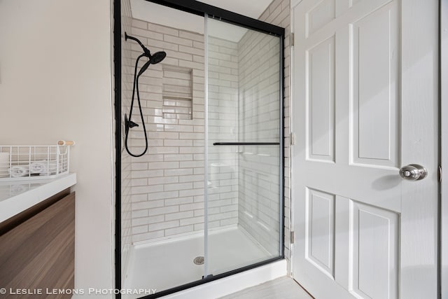 full bathroom with a shower stall