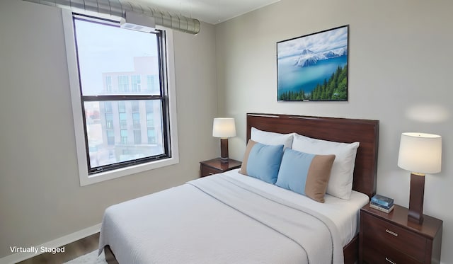 4015 N Milwaukee Ave Unit 516, Chicago, IL 60641 - bedroom featuring baseboards