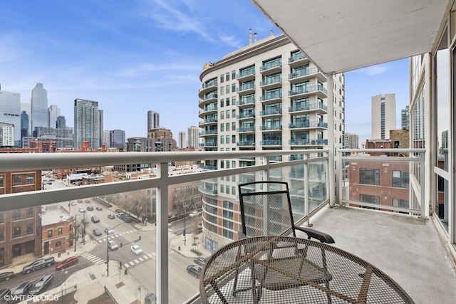 balcony featuring a view of city