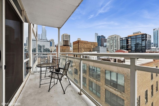 balcony featuring a city view