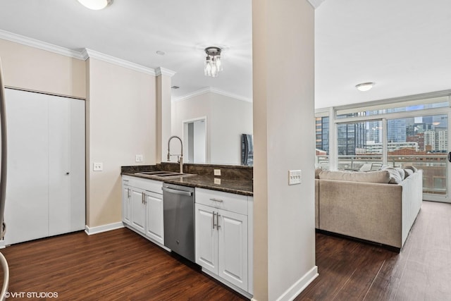 kitchen featuring dishwasher, ornamental molding, a sink, and dark wood-style floors