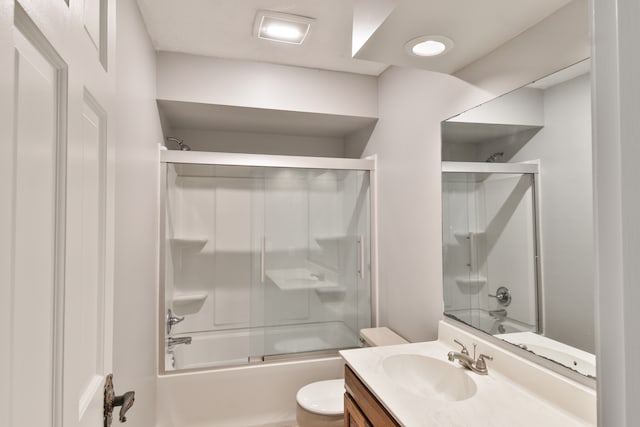 208 Carol Ct Unit A2, Pontiac, IL 61764 - full bathroom with vanity, bath / shower combo with glass door, and toilet