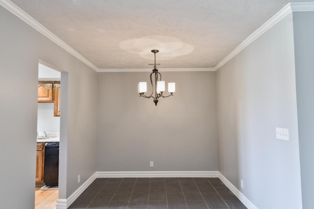 208 Carol Ct Unit A2, Pontiac, IL 61764 - empty room featuring crown molding, baseboards, a chandelier, a sink, and a textured ceiling