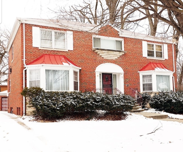 view of front of home with brick siding