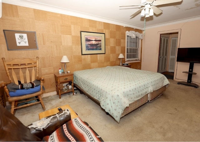 bedroom featuring wallpapered walls, crown molding, carpet floors, and ceiling fan