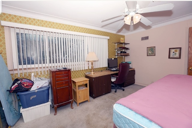 carpeted bedroom with ornamental molding and wallpapered walls