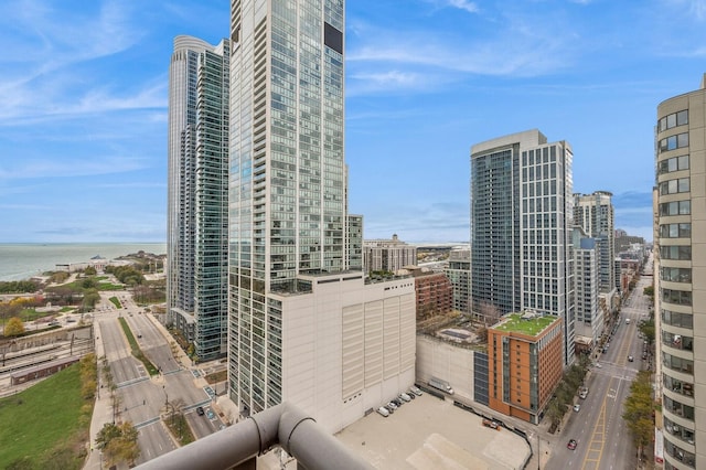 property's view of city featuring a water view