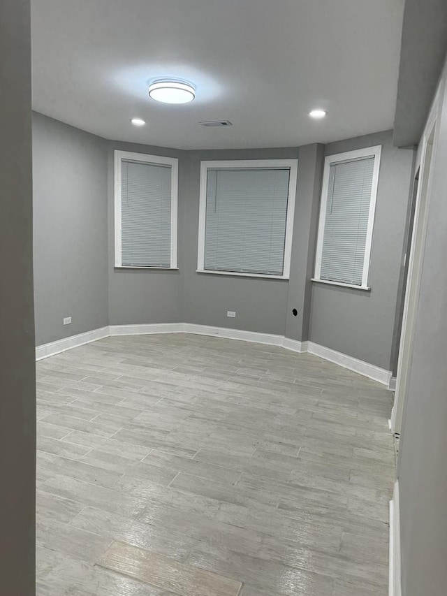 3323 N Central Park Ave, Chicago, IL 60618 - empty room with baseboards, recessed lighting, and light wood-type flooring