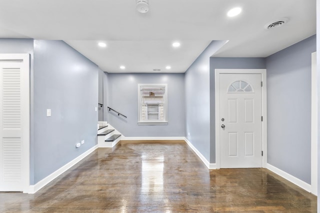 entrance foyer featuring recessed lighting, visible vents, baseboards, and stairs