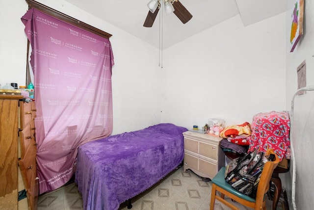 bedroom with light floors and ceiling fan