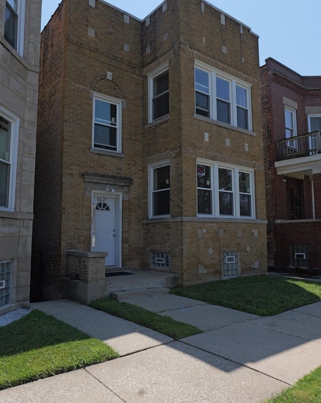 view of front facade with brick siding