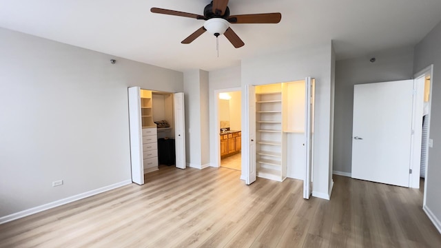 unfurnished bedroom featuring light wood-style floors and baseboards