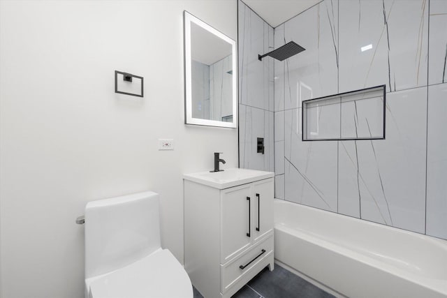 bathroom with  shower combination, vanity, and toilet