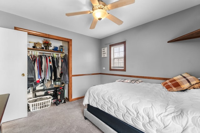 bedroom with carpet floors, a closet, and ceiling fan