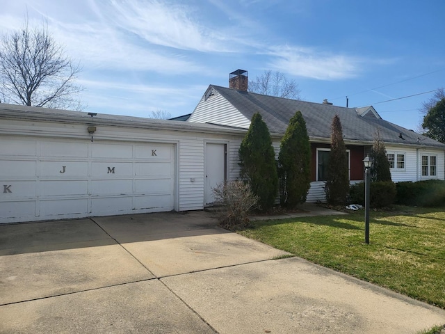 single story home featuring an attached garage, driveway, a chimney, and a front lawn