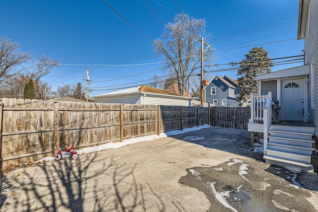 view of yard with a fenced backyard and a patio