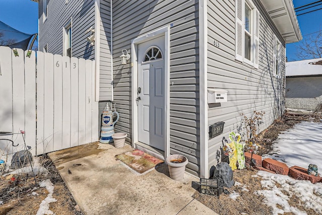 property entrance with fence