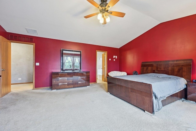 bedroom with a ceiling fan, carpet, visible vents, and vaulted ceiling