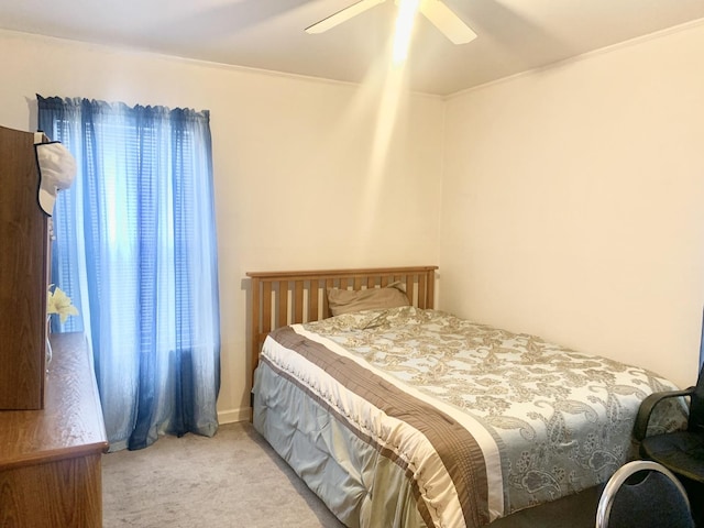 bedroom featuring carpet and ceiling fan