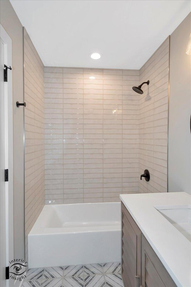 full bathroom with vanity, tile patterned flooring, and shower / tub combination