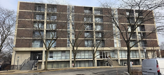 view of building exterior with stairs