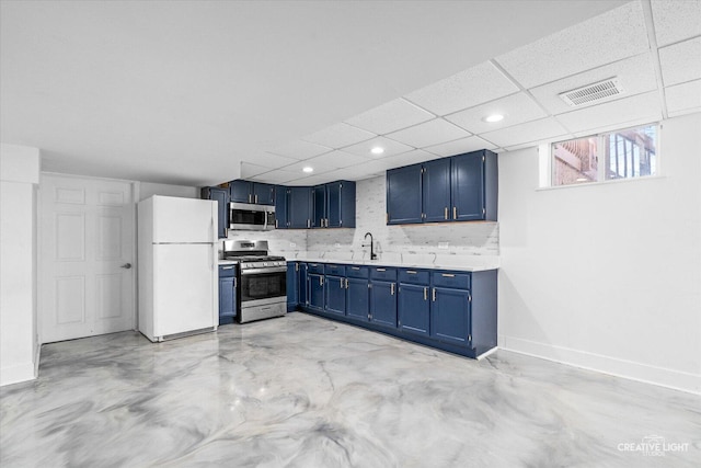 kitchen featuring blue cabinets, visible vents, baseboards, light countertops, and appliances with stainless steel finishes